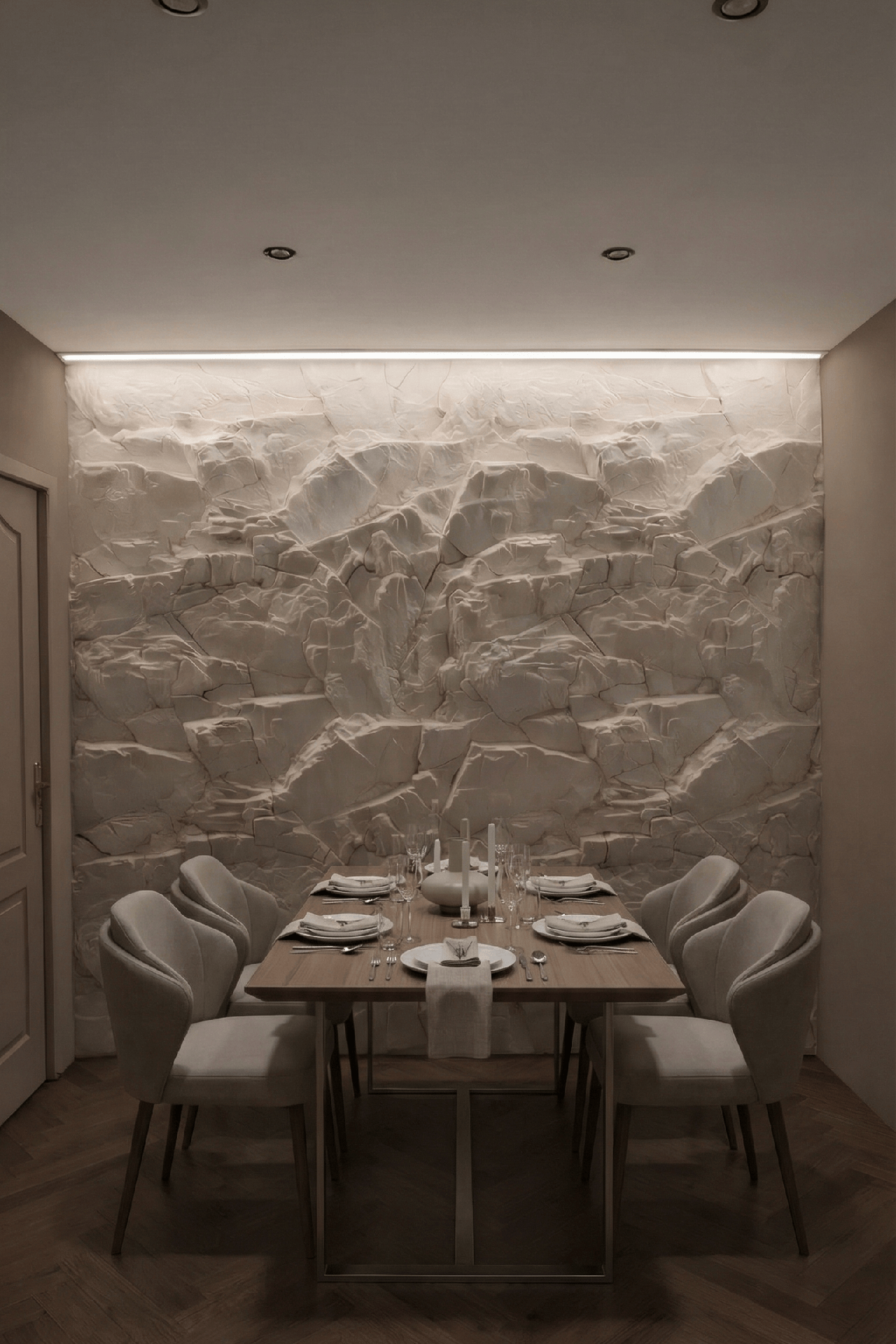 lumière rasante éclairant un mur en pierre dans une salle à manger